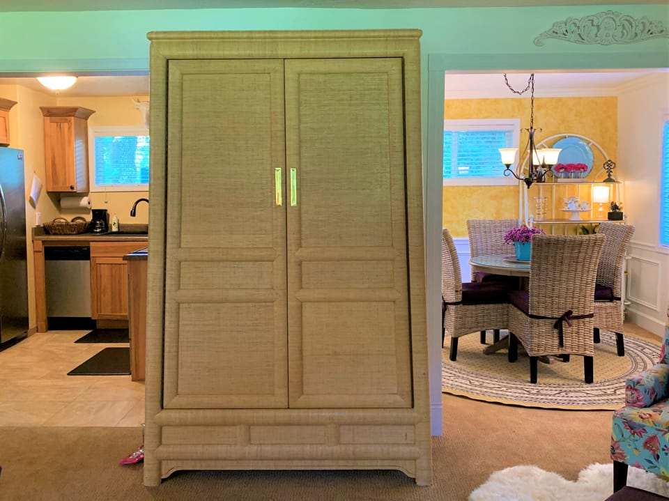 lovely and functional room dividing armoir
