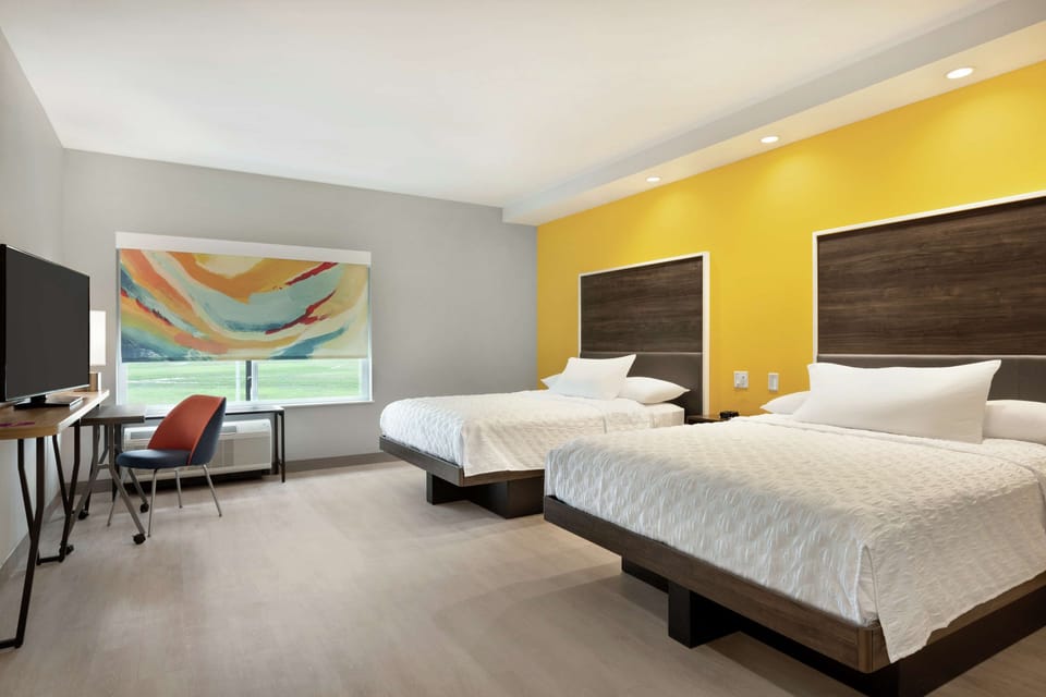Premium bedding, desk, blackout drapes, iron/ironing board