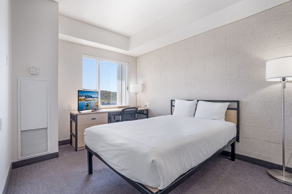 Suite, 2 Bedrooms, Kitchenette | 2 bedrooms, desk, laptop workspace, blackout drapes