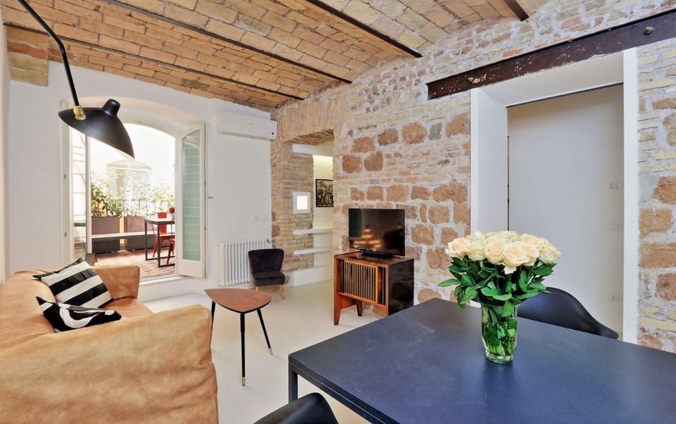 Apartment, 1 Bedroom | Living room | Flat-screen TV