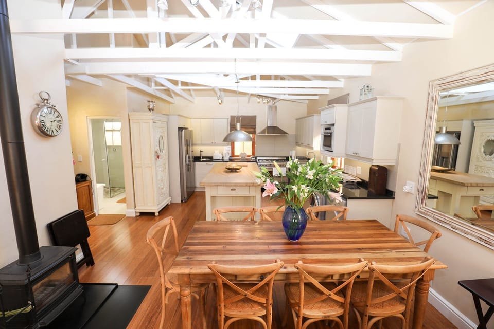 Ideal dining area infront of a stove fireplace