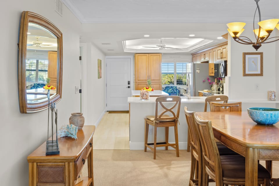 Dining area with ample seating at the island, kitchen counter or dining table.