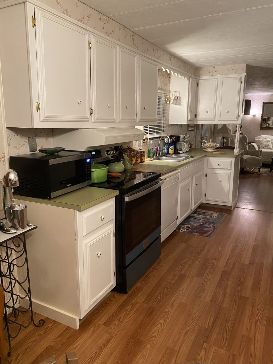 Kitchen with dishwasher, microwave, stove/oven, refrigerator/freezer, blender