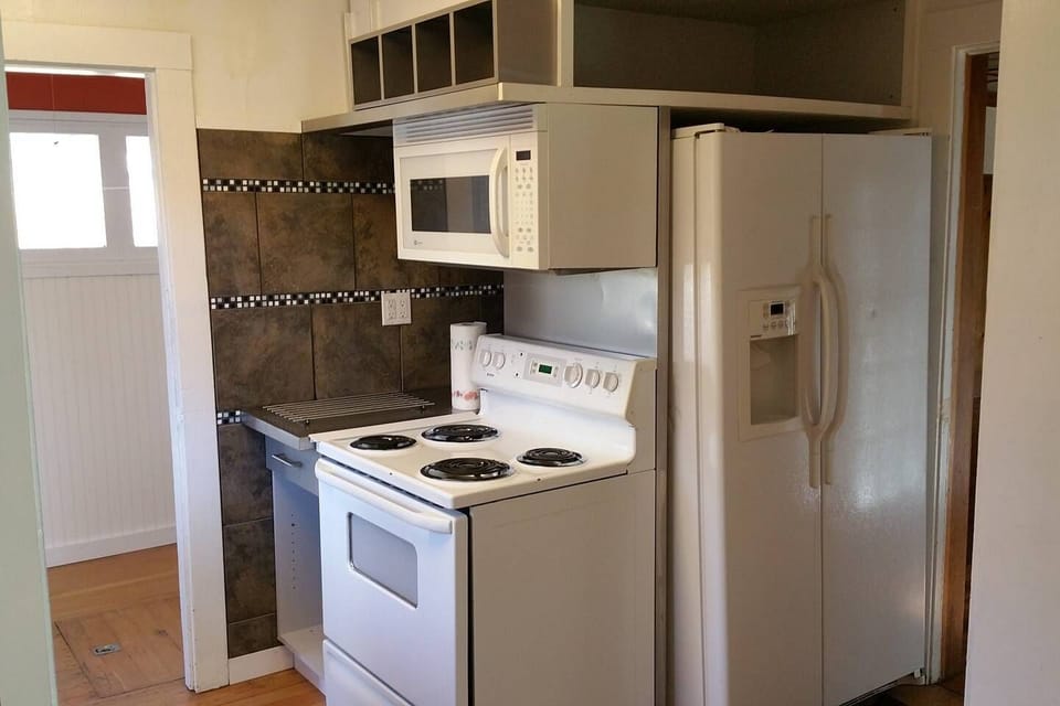 Fully Equipped kitchen includes Cookware & Bakeware + Dishes and Silverware.