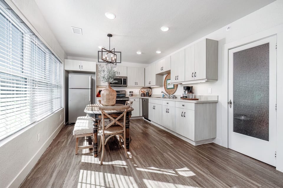 Luxury Apartment | Private kitchen | Coffee/tea maker, dining tables