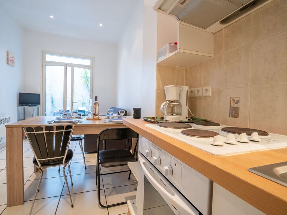 Cabinetry, Furniture, Countertop, Property, Wood, Kitchen, Interior Design, Floor, Flooring, Chair