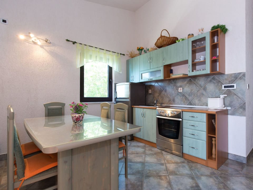 Furniture, Cabinetry, Property, Countertop, Table, Wood, Kitchen, Kitchen Stove, Kitchen Appliance, Drawer