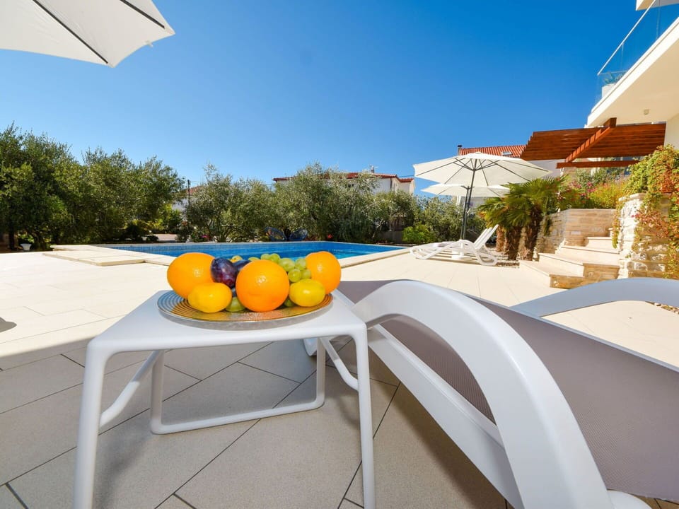 Sky, Table, Light, Plant, Food, Building, Azure, Tree, Outdoor Furniture, Shade