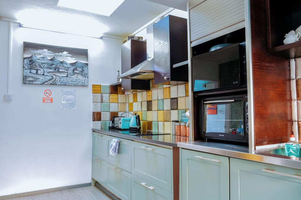 Standard Apartment, Multiple Beds, Non Smoking | Private kitchen | Espresso maker, coffee/tea maker, full-size fridge, oven