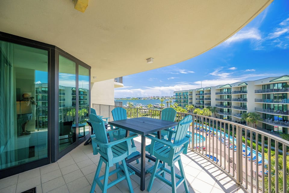 Bask in the sun on the balcony while enjoying the scenic bay view, perfect for relaxation and unwinding