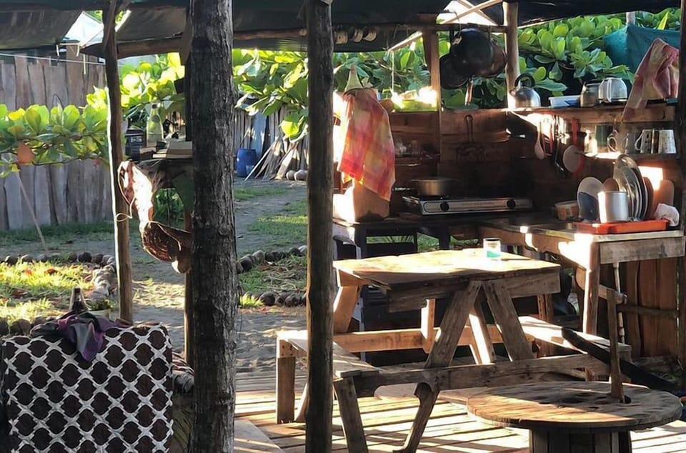 Glamping, Oceanfront | Shared kitchen | Cookware/dishes/utensils
