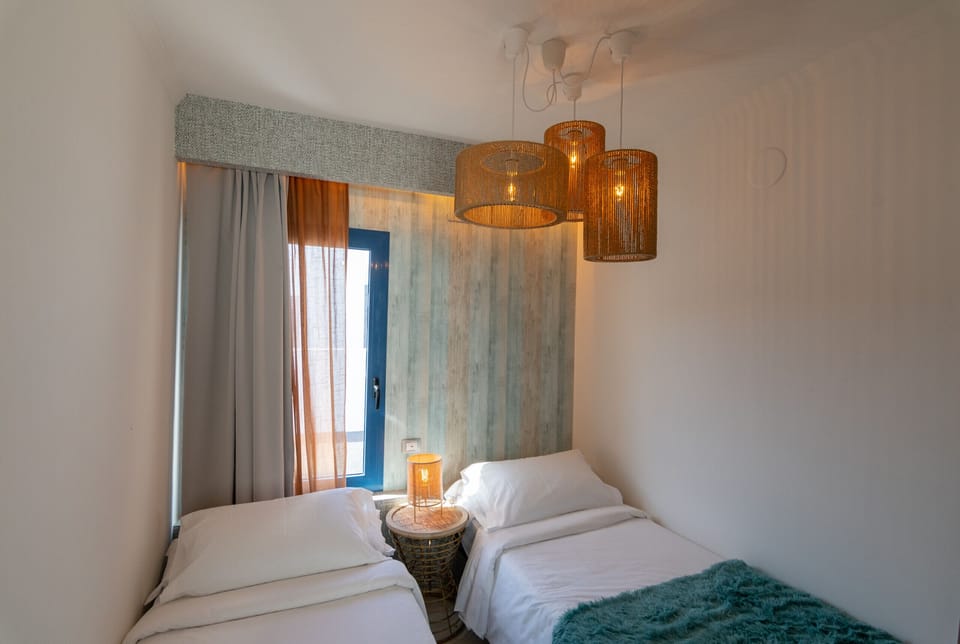 Modern bedroom with two single beds