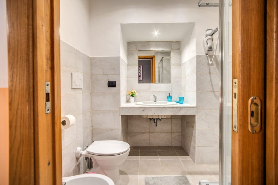 Double or Twin Room | Bathroom | Shower, hair dryer, bidet, towels