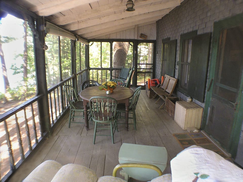 Relax in rocking chairs or on chaise lounge  (photo prior to renovations)