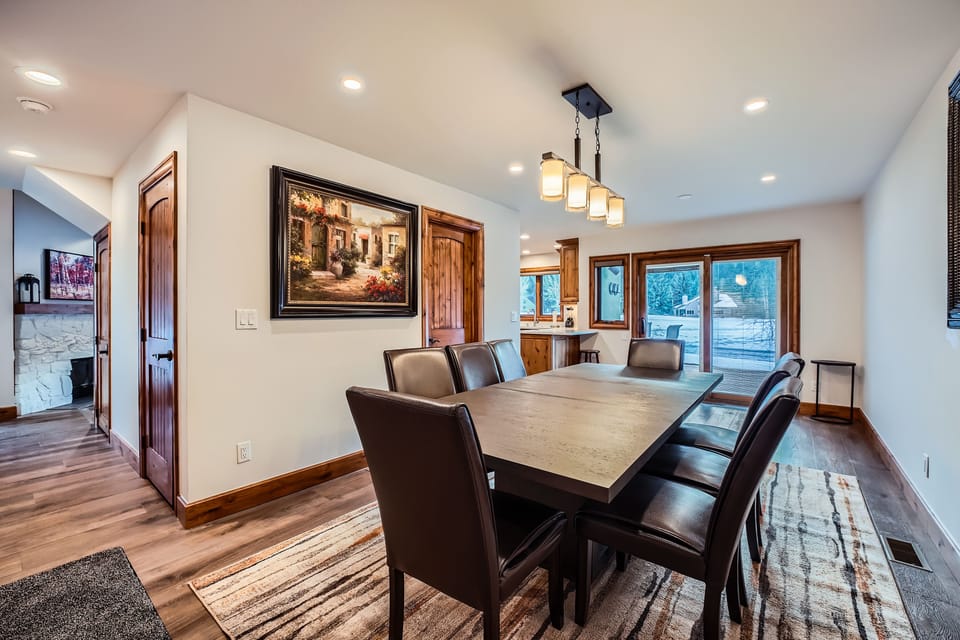Dining room seats 8 comfortably, two bar stools in the kitchen