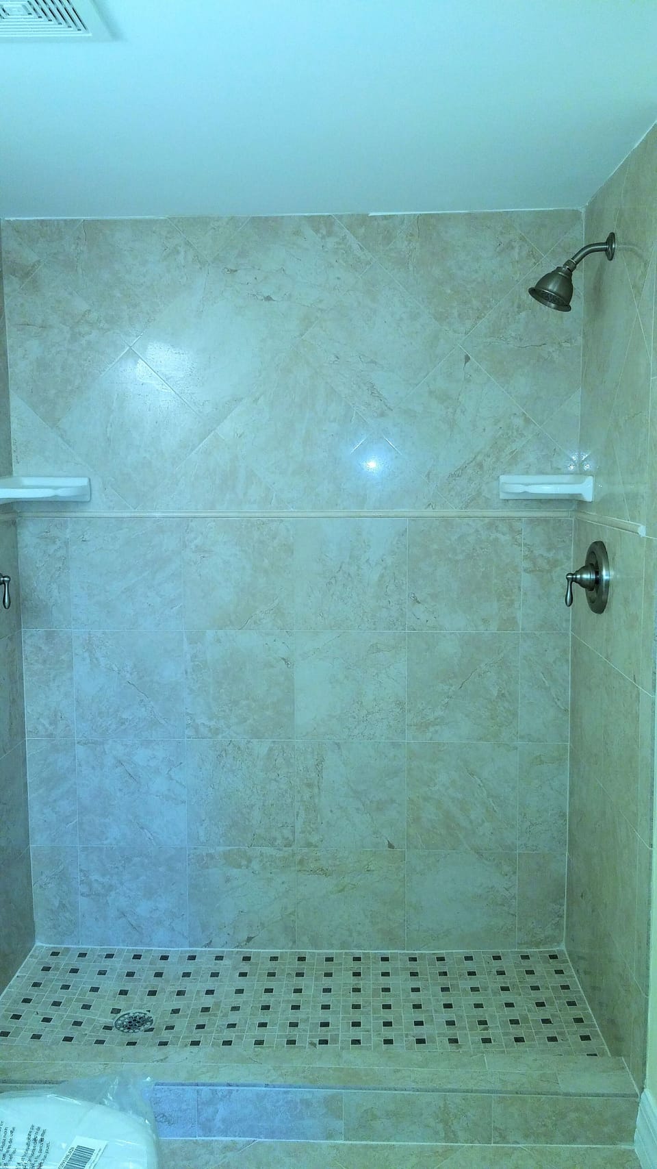 Brand new bath with double shower, Italian porcelain tile,  granite vanity