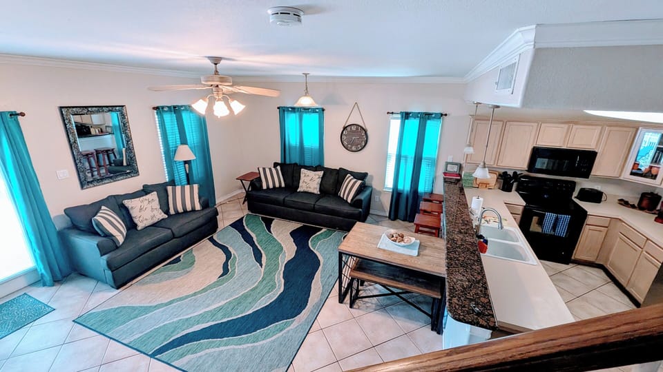 view of living area from the stairs
