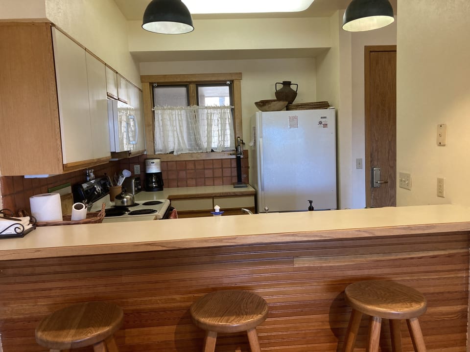 Breakfast bar and open kitchen.