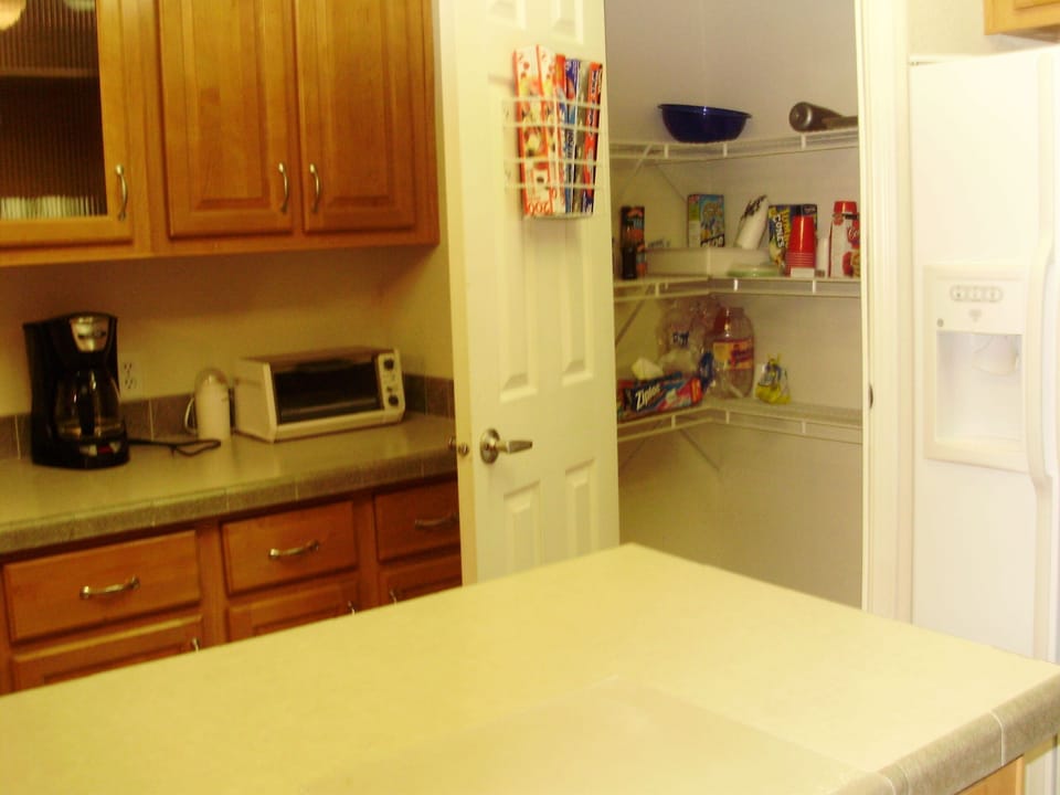 Fully equipped Kitchen with walk in pantry. 