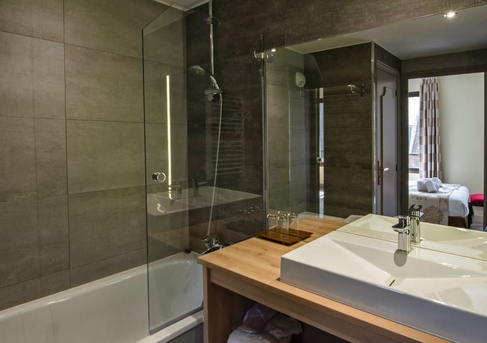 Shower, free toiletries, hair dryer, bathrobes