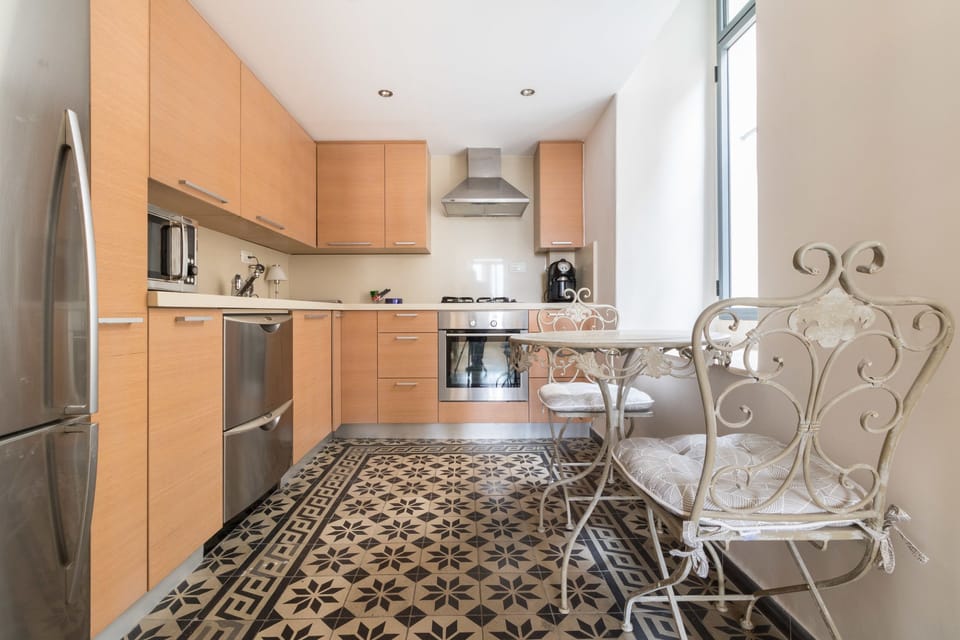Deluxe Duplex, 2 Bedrooms | Private kitchen | Full-size fridge, microwave, oven, stovetop