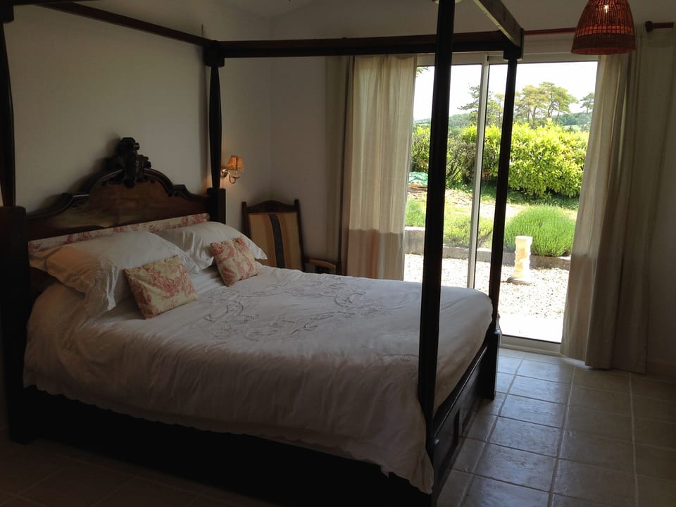 Master bedroom with 4 poster bed