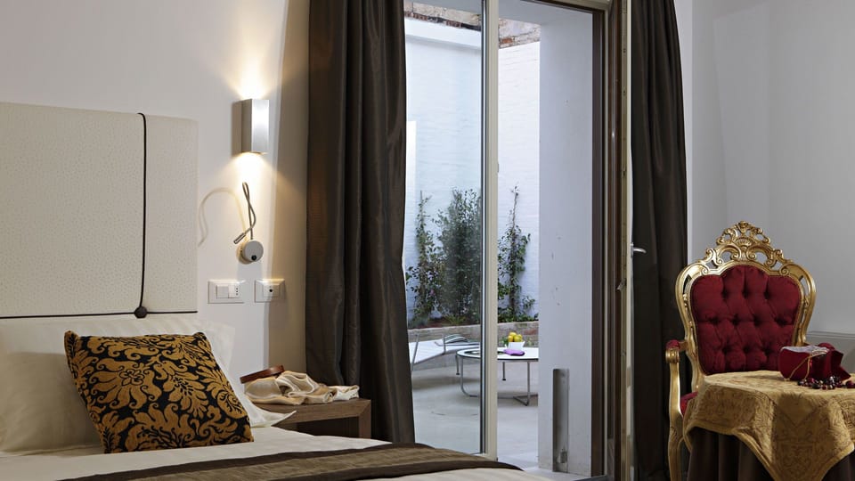 Superior Double Room, Patio | Down comforters, minibar, in-room safe, desk
