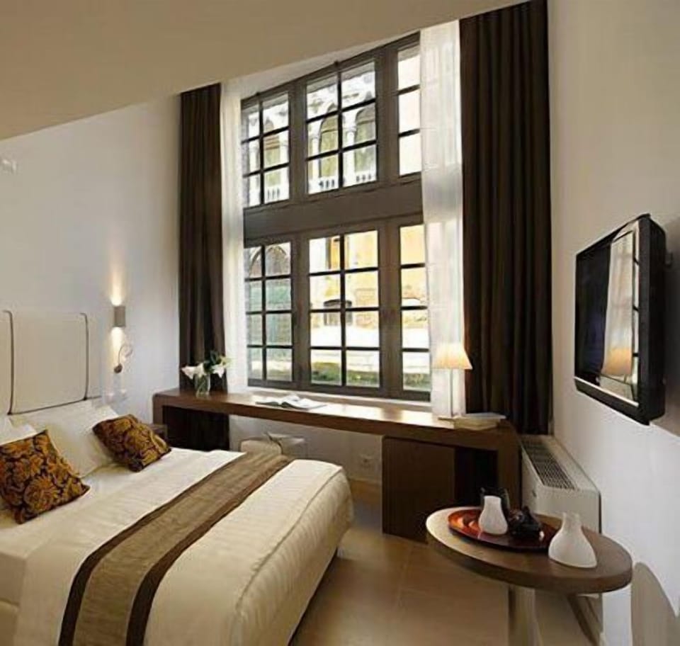 Duplex | Down comforters, minibar, in-room safe, desk