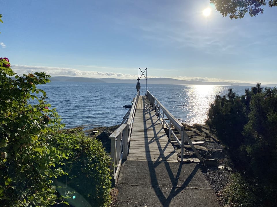 Private dock offers moorage for boats up to 30'