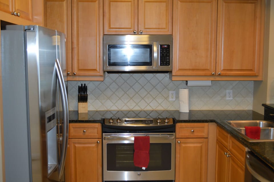 Large, well stocked kitchen with high end appliances