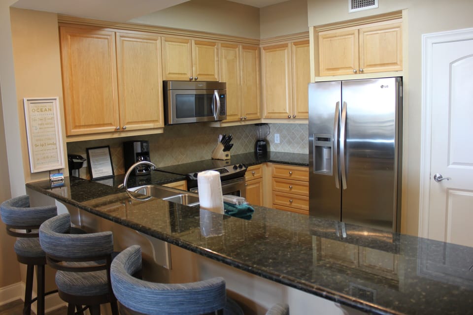 Well stocked kitchen with hi-end appliances