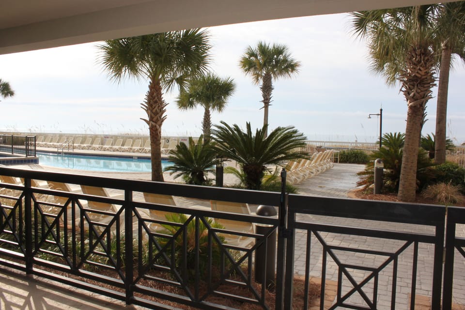 Direct view of the pool deck and ocean - rare for a first floor unit