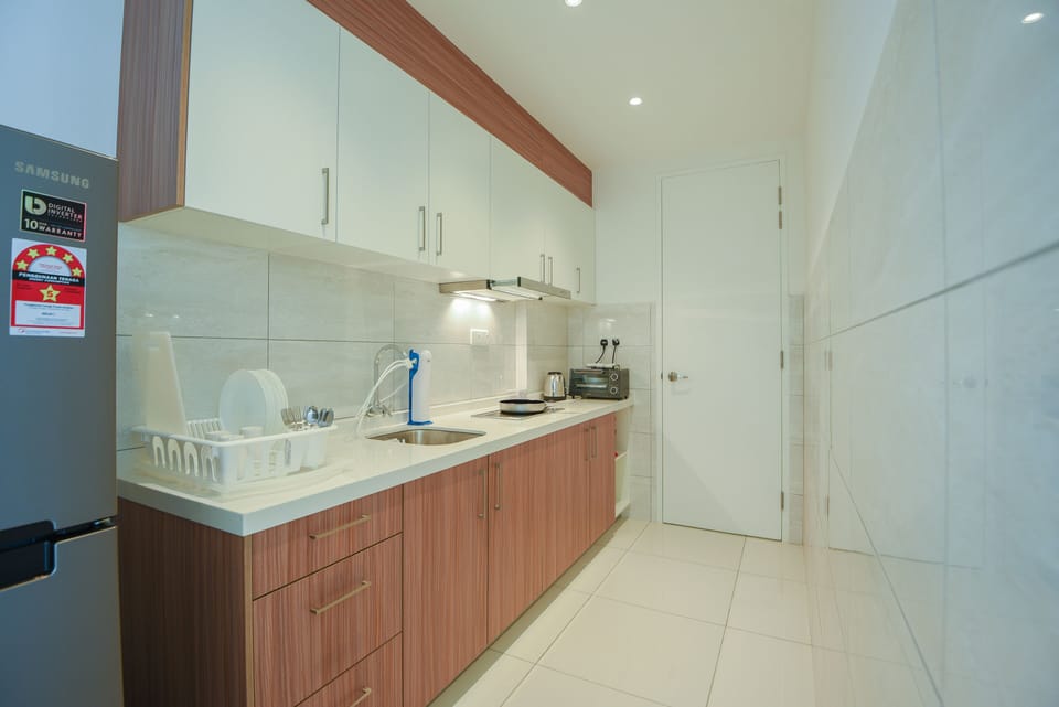 Kitchen equipped with full amenities and water drinking system.