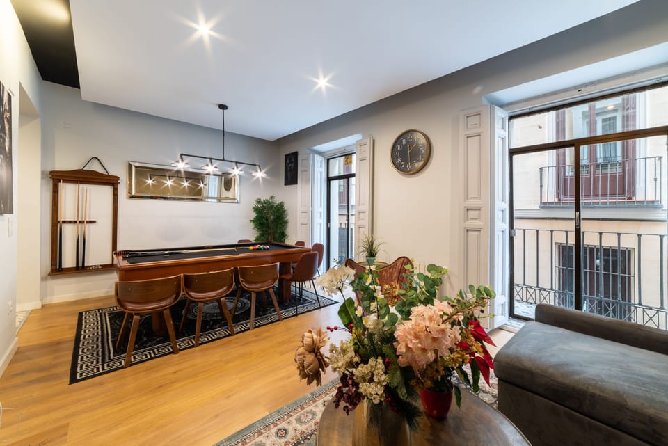Living room & dining table with 2 balconies- view from the left- Plaza Tirso 