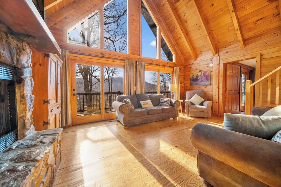 Long mountain views, expansive wood and stone in the spacious family room.