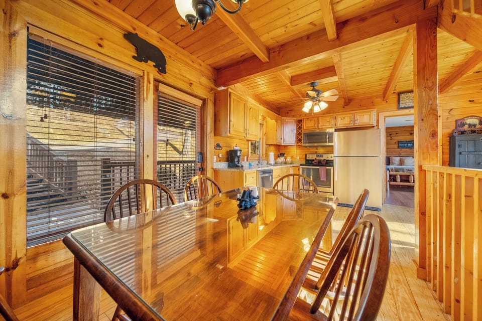 Dining for 6-8 plus an extra table and chairs stored in a nearby closet.