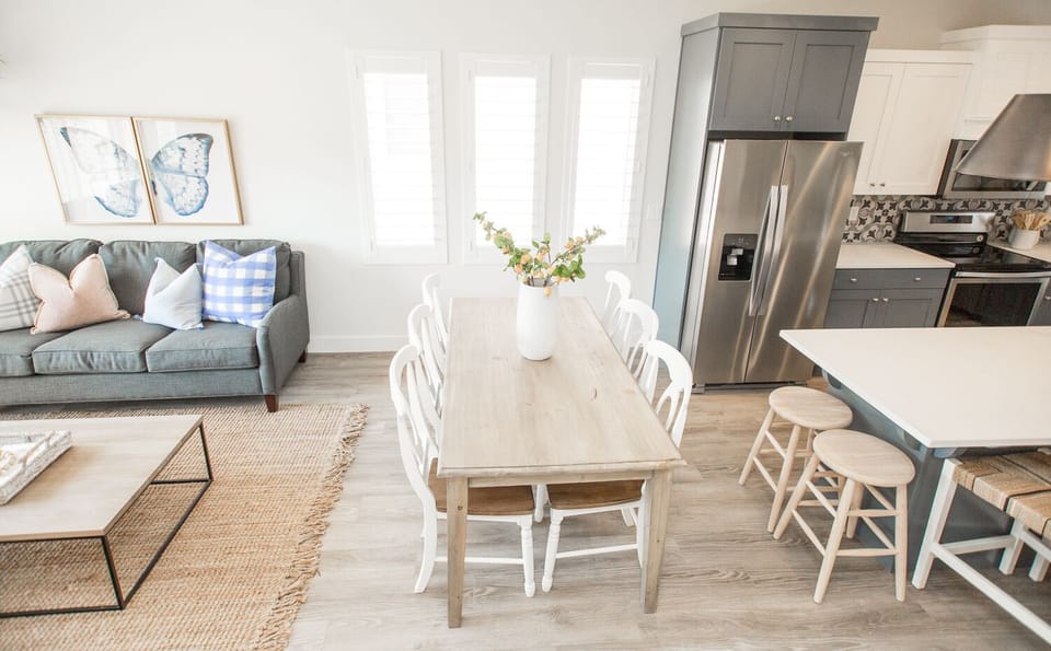 Open Dining, Kitchen, and Living Room with Natural Light