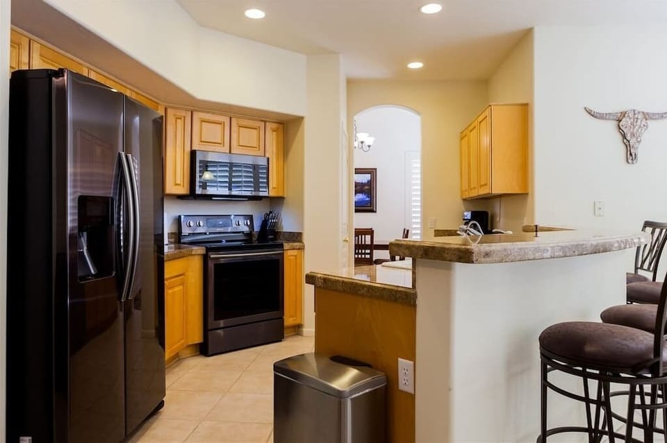 Fully stocked kitchen with matching sleek appliances