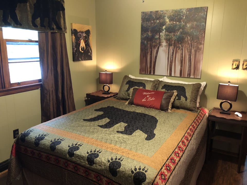 Master bedroom, queen bed, makeup table with mirror, chest of drawers and closet