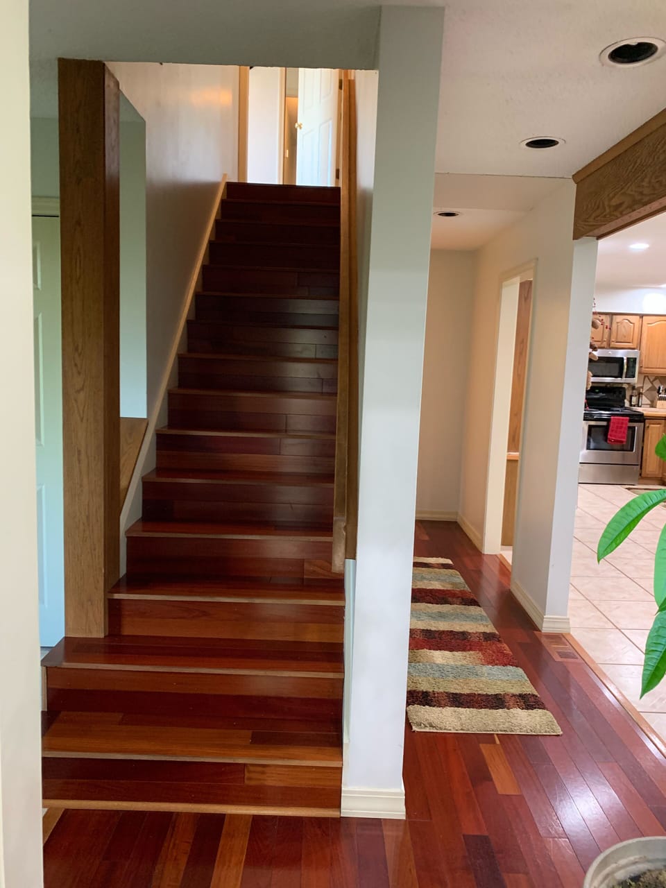 Stairs to master bedroom and bath