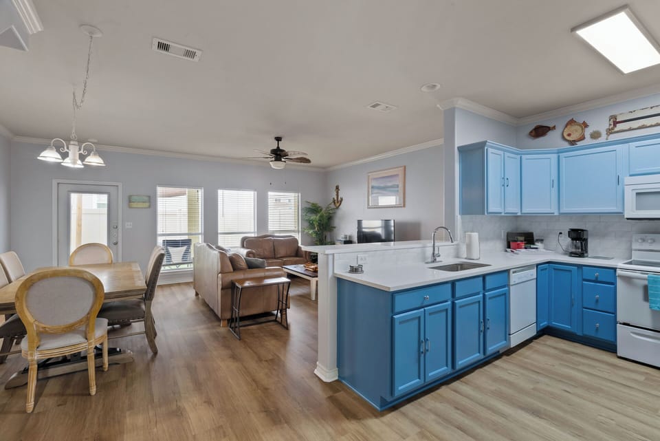 Table for six to eat with additional barstools for the kitchen island