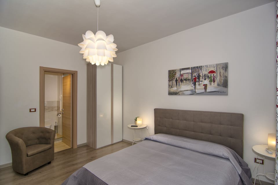 Triple Room | Blackout drapes, WiFi (free), bed sheets