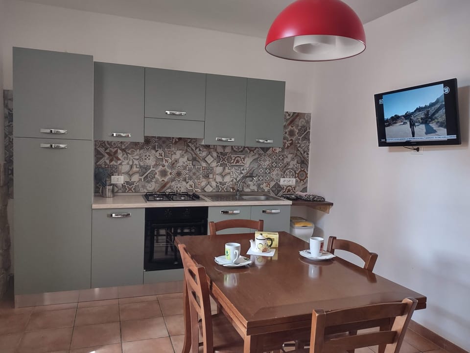Apartment, 3 Bedrooms, Terrace | Private kitchen | Full-size fridge, stovetop, coffee/tea maker, highchair