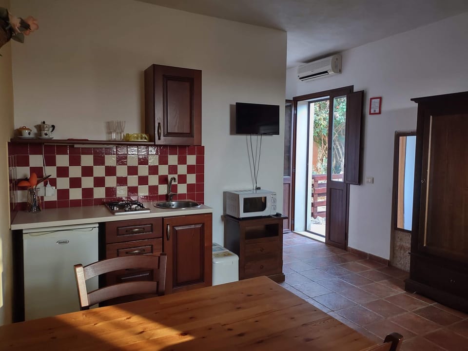 Studio | Private kitchen | Full-size fridge, stovetop, coffee/tea maker, highchair