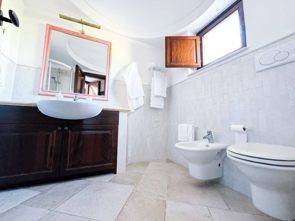 Standard Apartment, 1 Queen Bed with Sofa bed, Garden View | Bathroom | Shower, hair dryer, bidet, heated floors