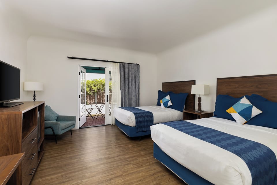 Standard Room, 2 Double Beds, Accessible, Patio | Pillowtop beds, in-room safe, desk, laptop workspace