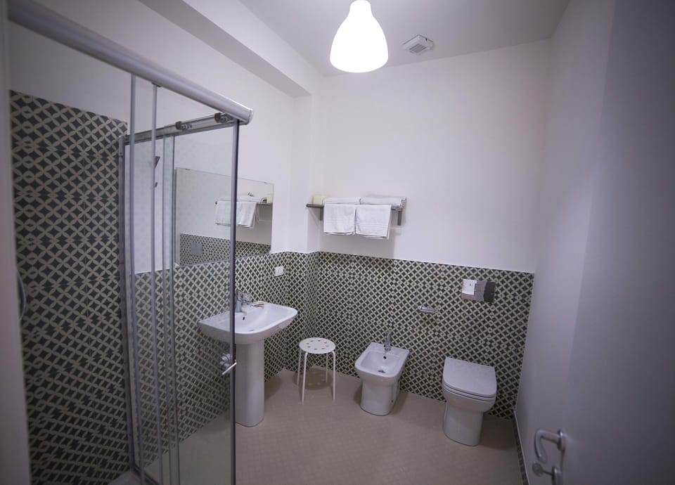 Shower, free toiletries, hair dryer, bathrobes