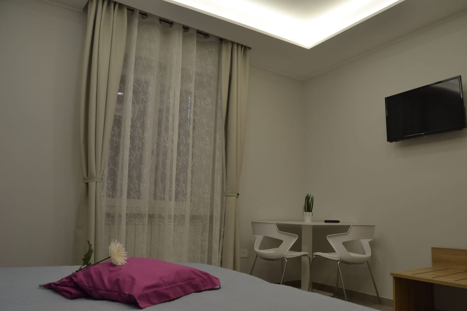 Premium bedding, desk, blackout drapes, soundproofing