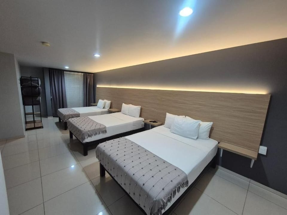 Family Room | Blackout drapes, iron/ironing board, free WiFi, bed sheets