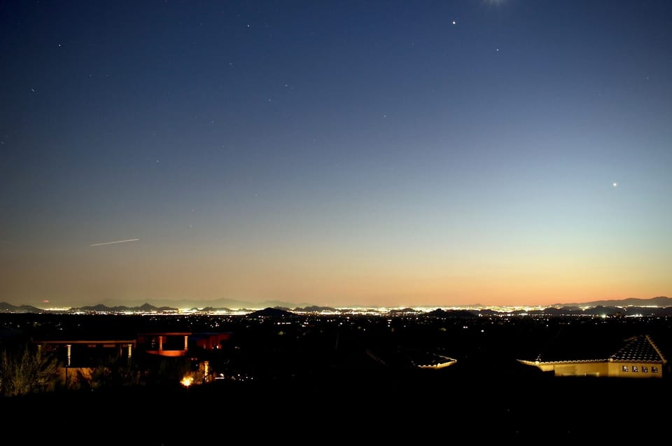 Evening view from rooftop deck looking southwest (Phoenix valley)